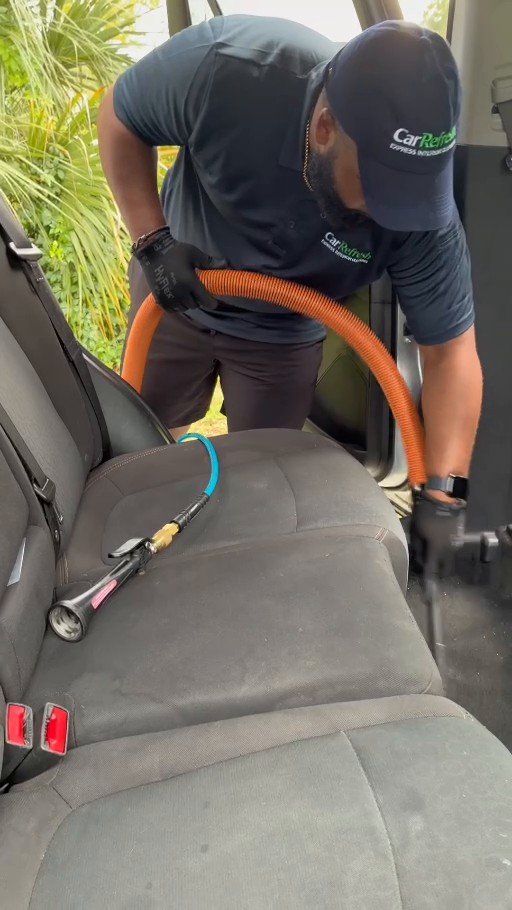 Car Refresh cleaning a car interior